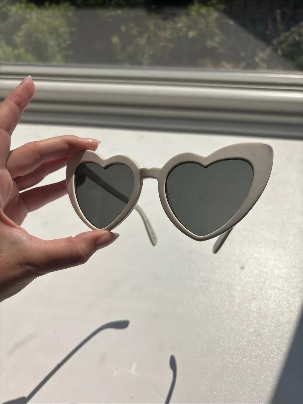 Yves Saint Laurent Loulou heart sunglasses